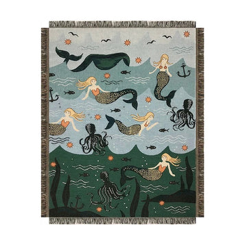 Mermaid-themed blanket with mermaids, octopuses, and sea creatures on a blue and green background.