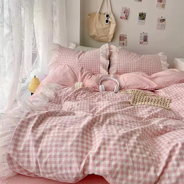 Aesthetic morning routine scene with coffee on ruffled gingham bed