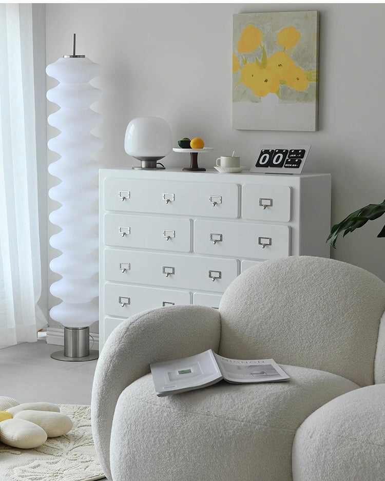 Dopamine pink storage cabinet with drawers used in aesthetic home interior