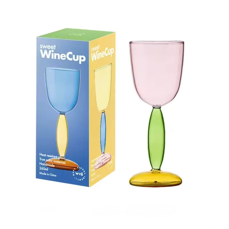 Colorful wine glass with a matching box on a white background