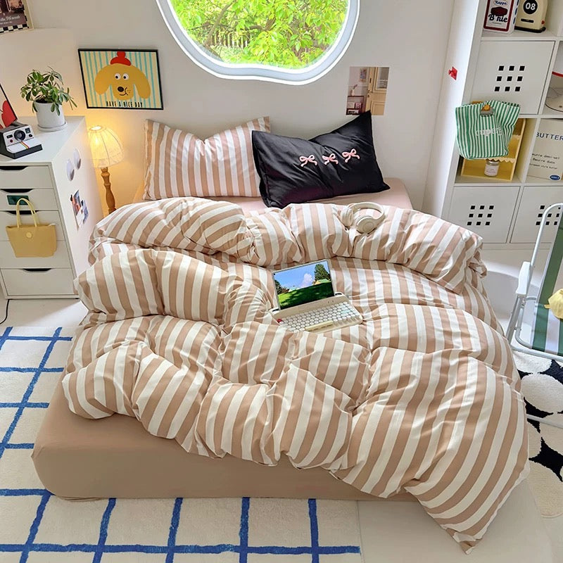 Beige striped cotton bedding set styled in a soft girl dorm room