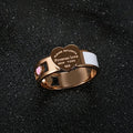 Big heart tag ring with white shell detail