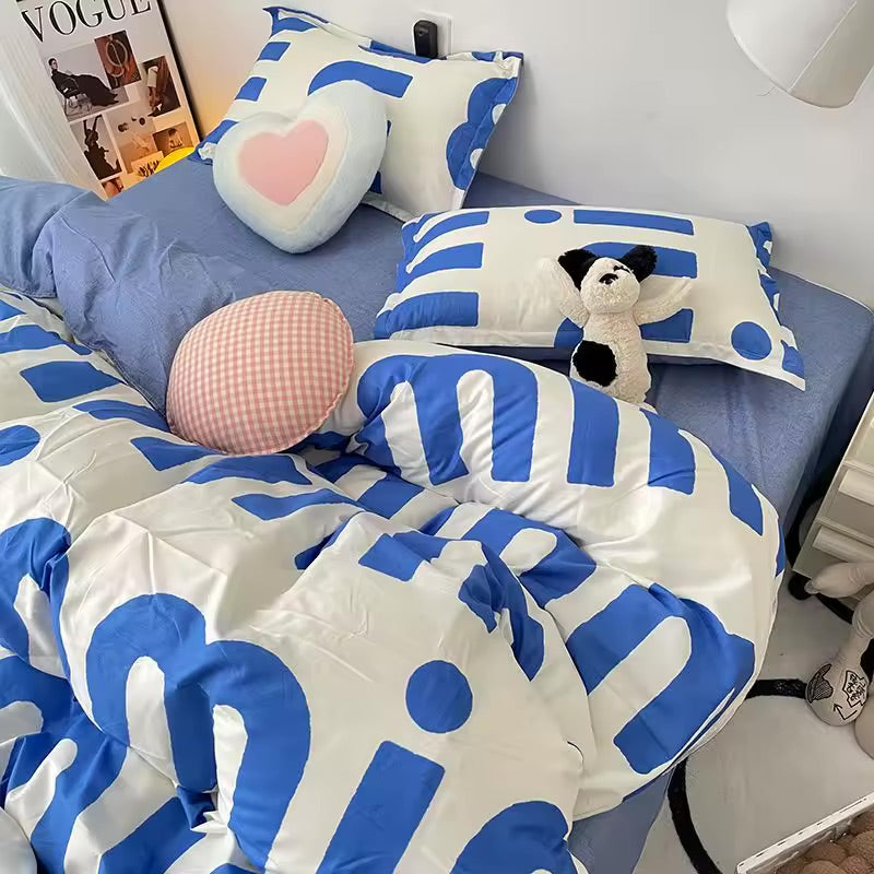 Bold blue letter bedding set in cozy Korean-style bedroom