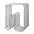 Metal wire side table on a white background