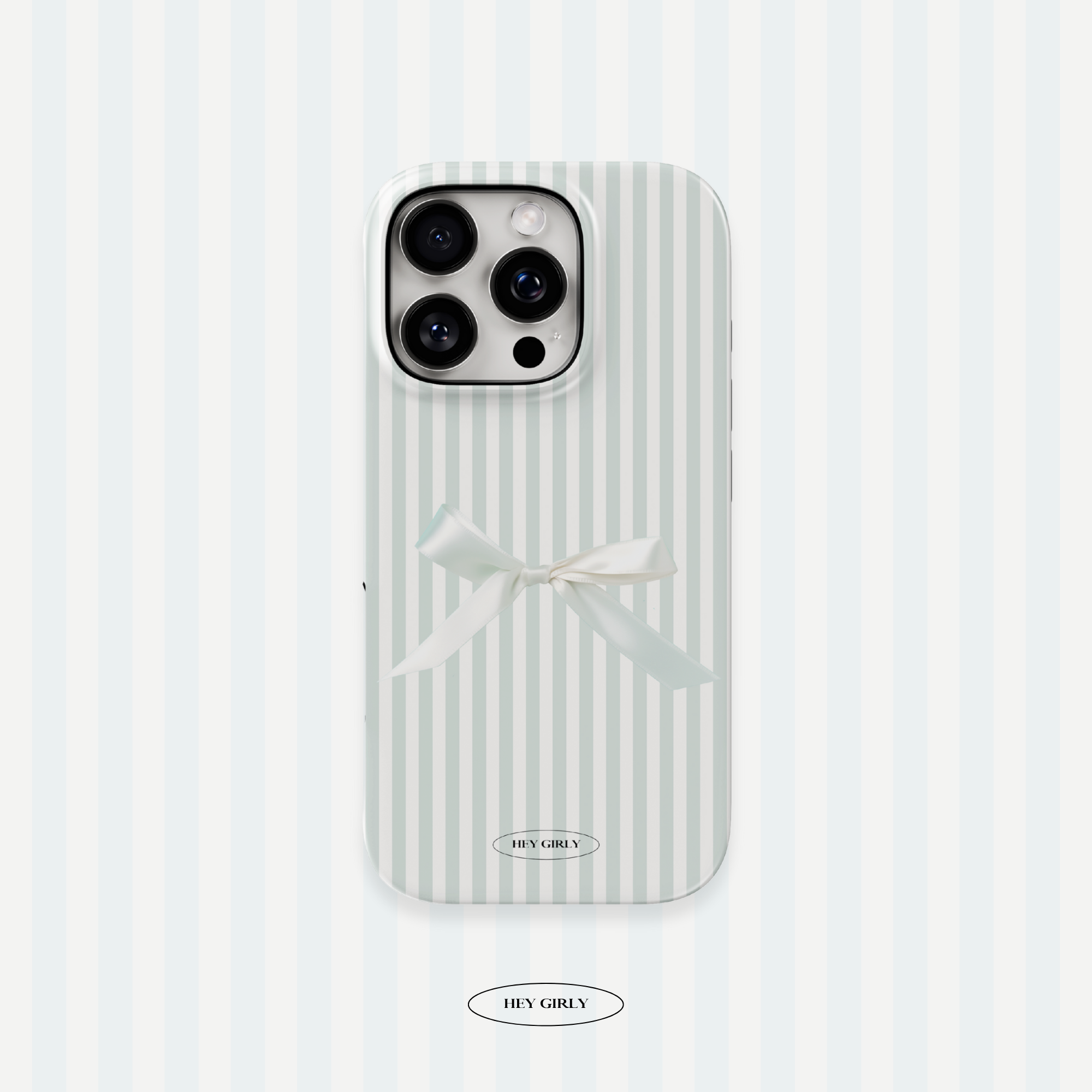 Phone case with white stripes and a bow on a light blue background