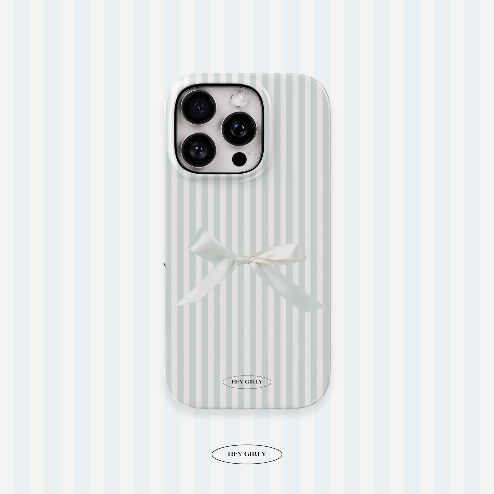 Phone case with white stripes and a bow on a light blue background