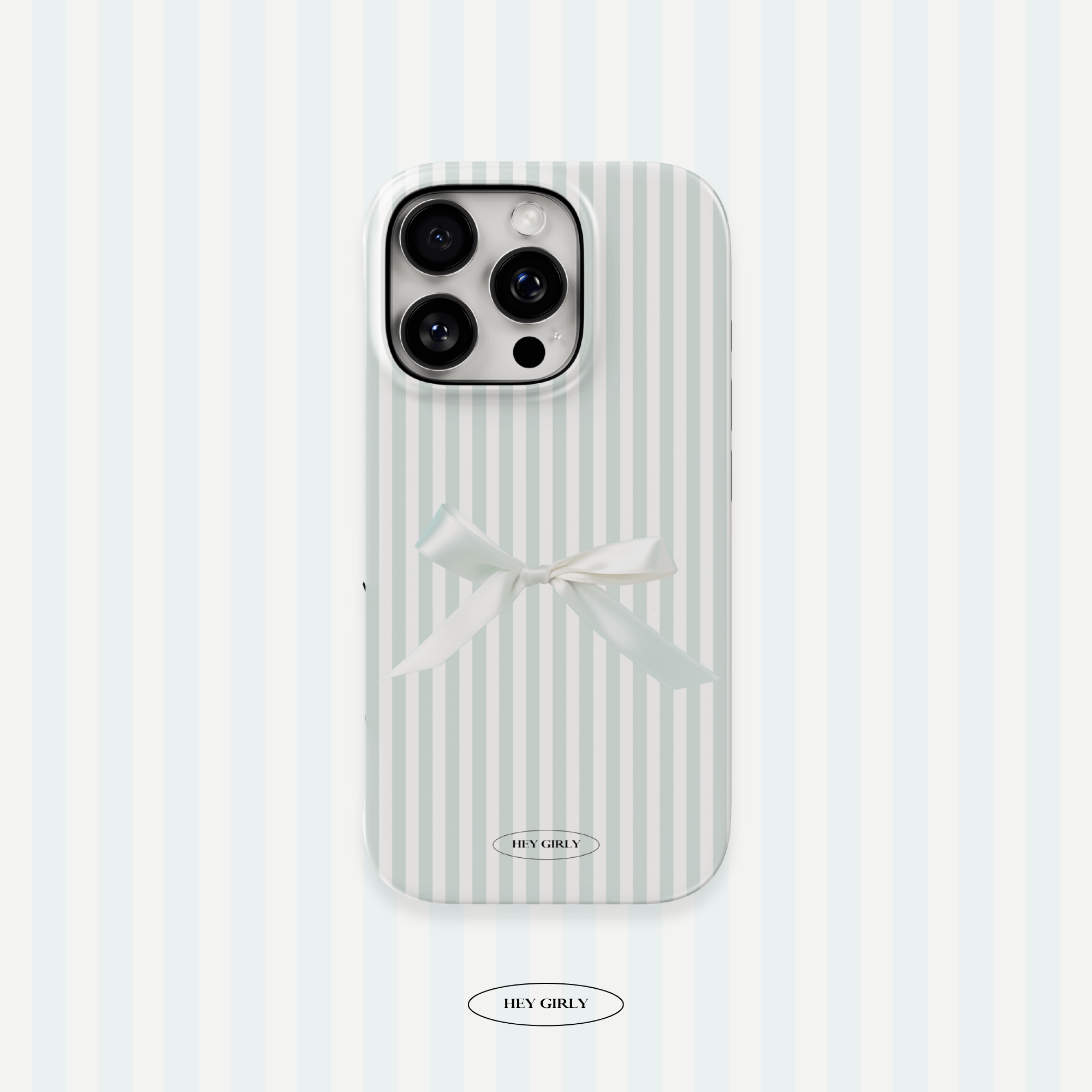 Phone case with white stripes and a bow on a light blue background