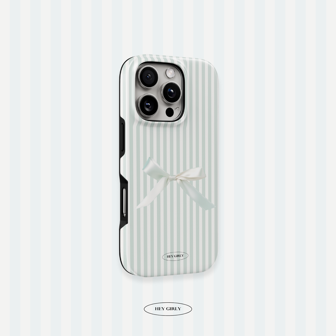Phone case with white stripes and a bow on a light blue background