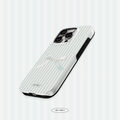 Phone case with a striped pattern on a light gray background