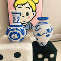 Vase placed on a dining table, complementing traditional Chinese interior design.