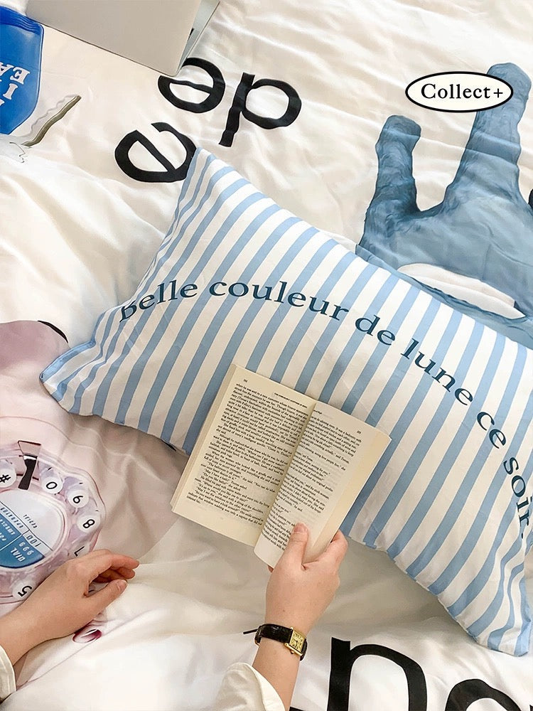 Blue and white bunny duvet cover with striped bedding details