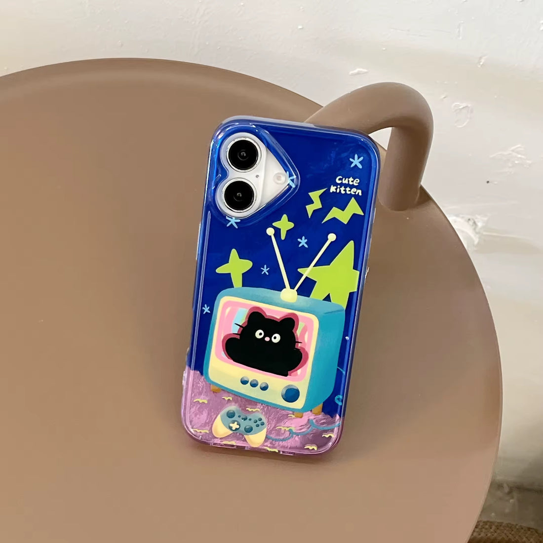 Blue Y2K TV cat iPhone case with retro cartoon kitten design and neon accents