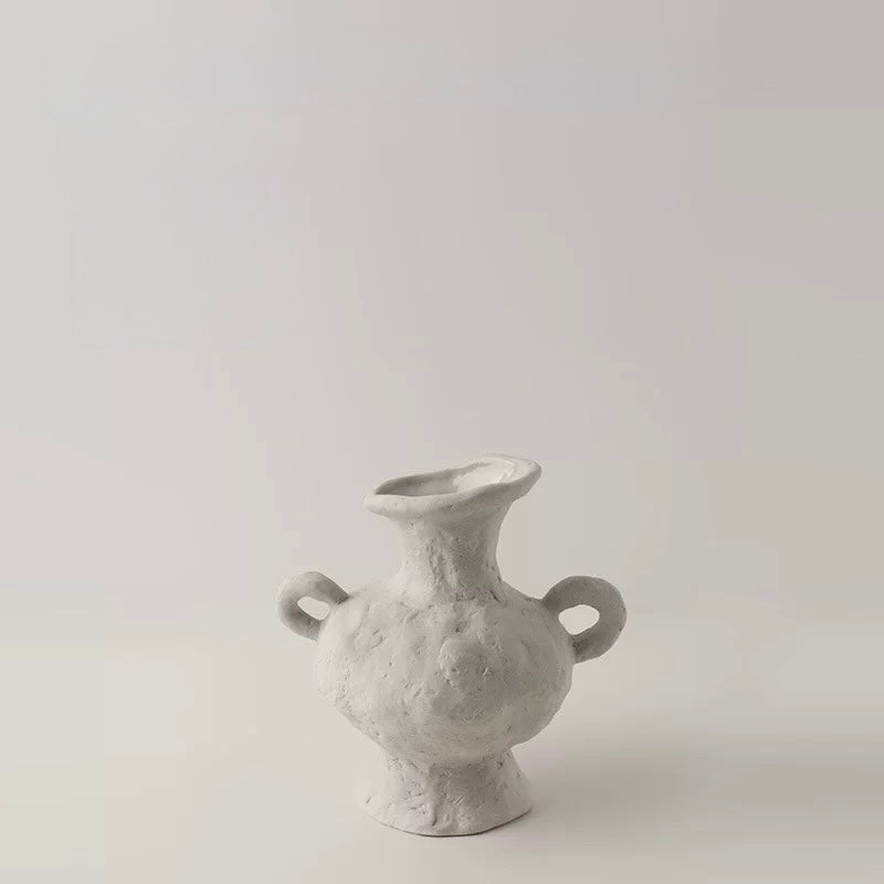 White textured vase on a light gray background