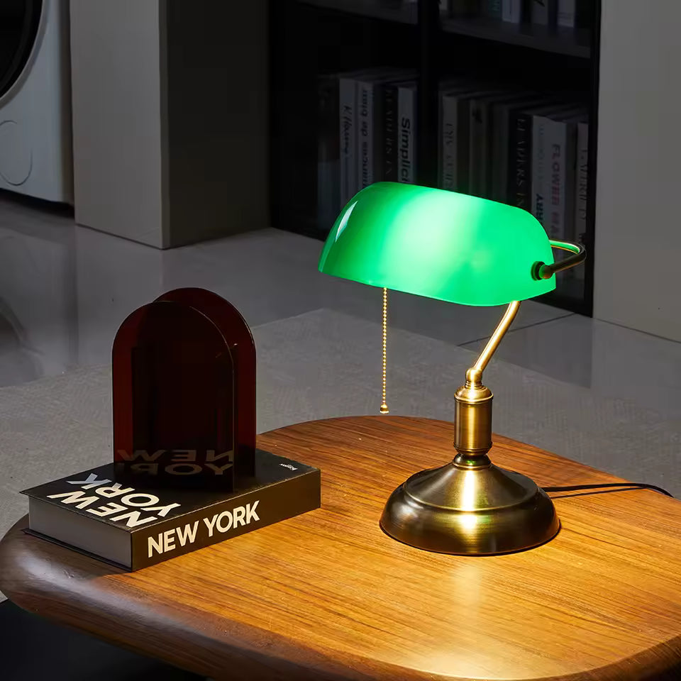Vintage green desk lamp with emerald shade for dark academia rooms.