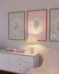 Coquette nursery wall art featuring bunny and carousel prints