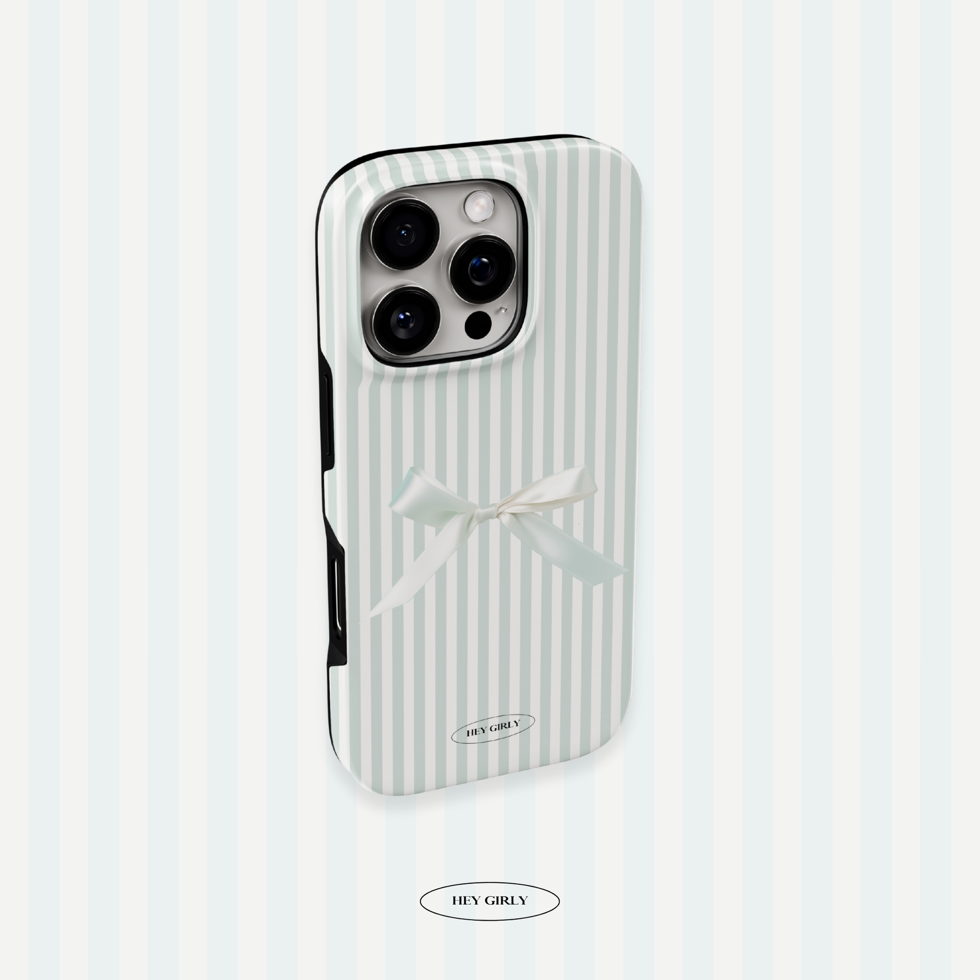 Phone case with striped design and bow on a light blue background