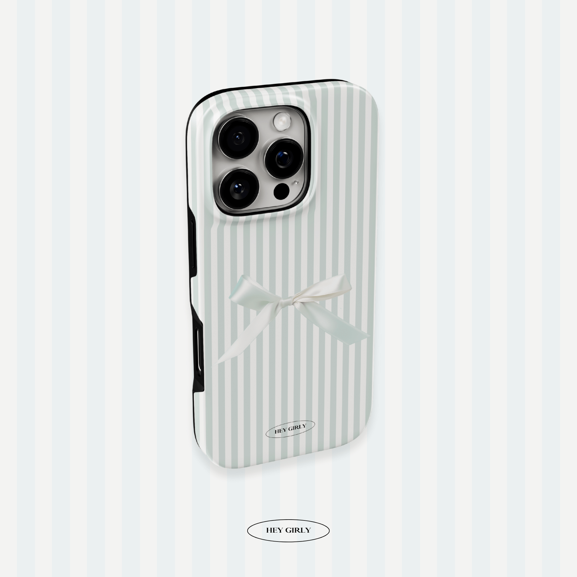 Phone case with striped design and bow on a light blue background