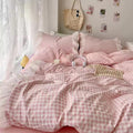 Aesthetic morning routine scene with coffee on ruffled gingham bed