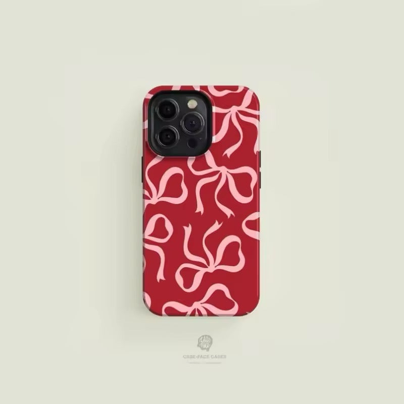 Red phone case with pink bows for iPhone 16, 15, 14