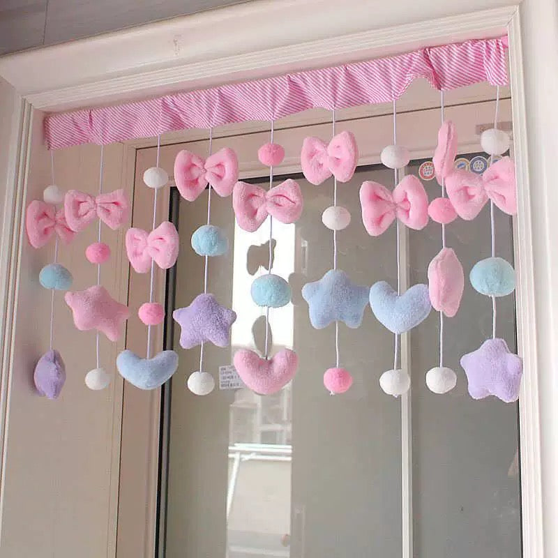 Aesthetic pastel curtain for soft girl dorm setup with bows and stars.