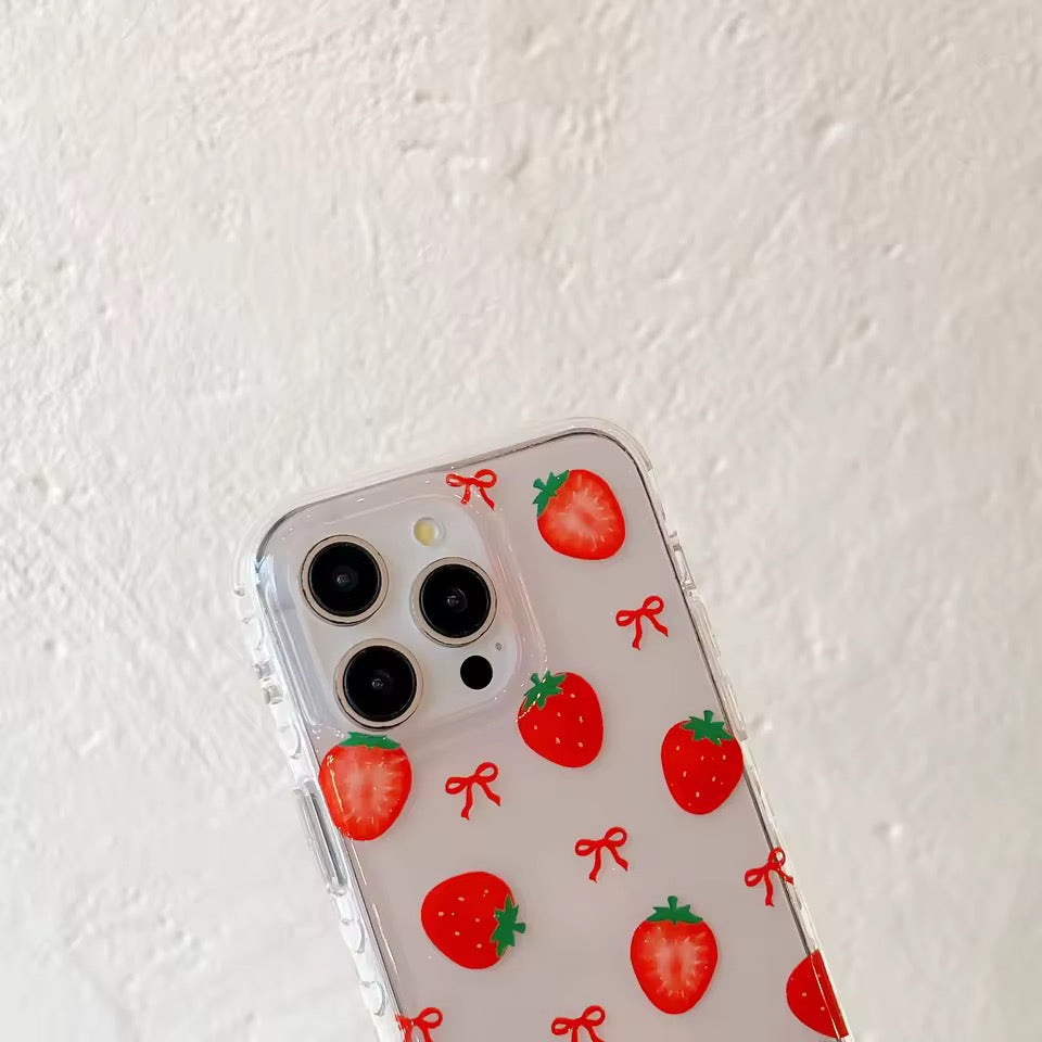Phone case with strawberry and bow pattern on a white background