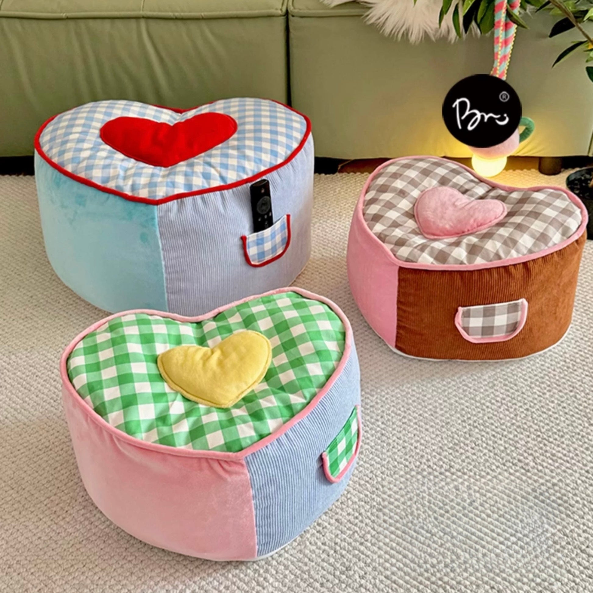 Plaid pouf cushion with EPP filling, styled in Canadian apartments.