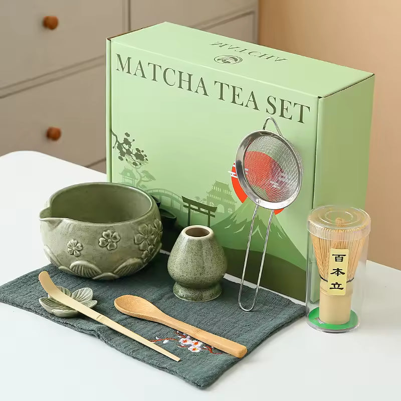 Matcha tea set with green box labeled 'Matcha Tea Set' on a white surface.