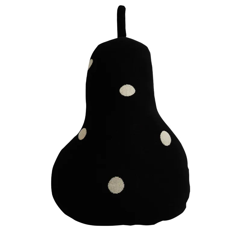 A black pear-shaped plush cushion with cream-colored polka dots, shown against a plain white background.