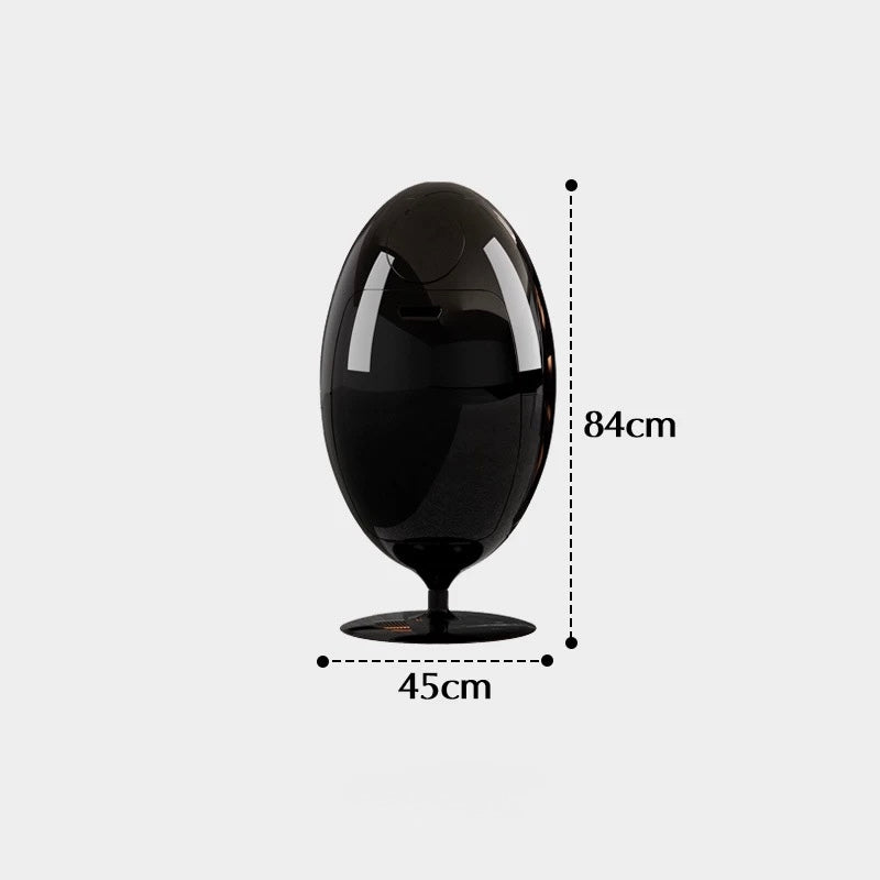 Black egg-shaped object with measurements on a white background