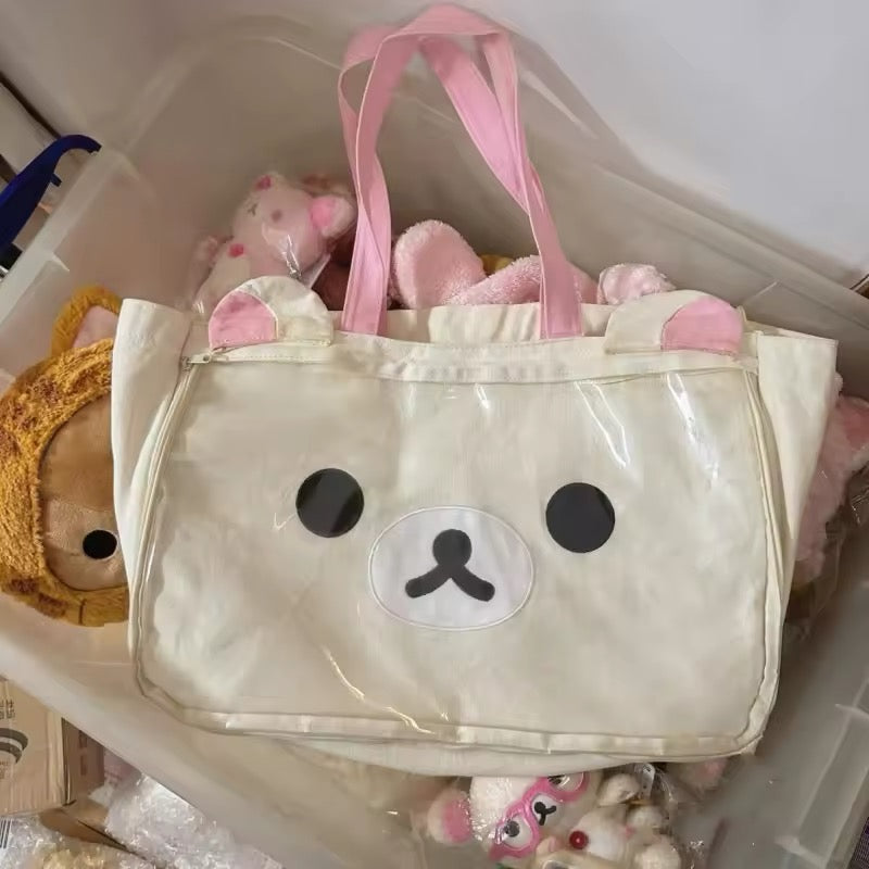 Kawaii rilakkumaed tote bag with pink handles on white background