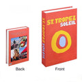 Room shelf setup with stacked colorful decorative books for visual interest.