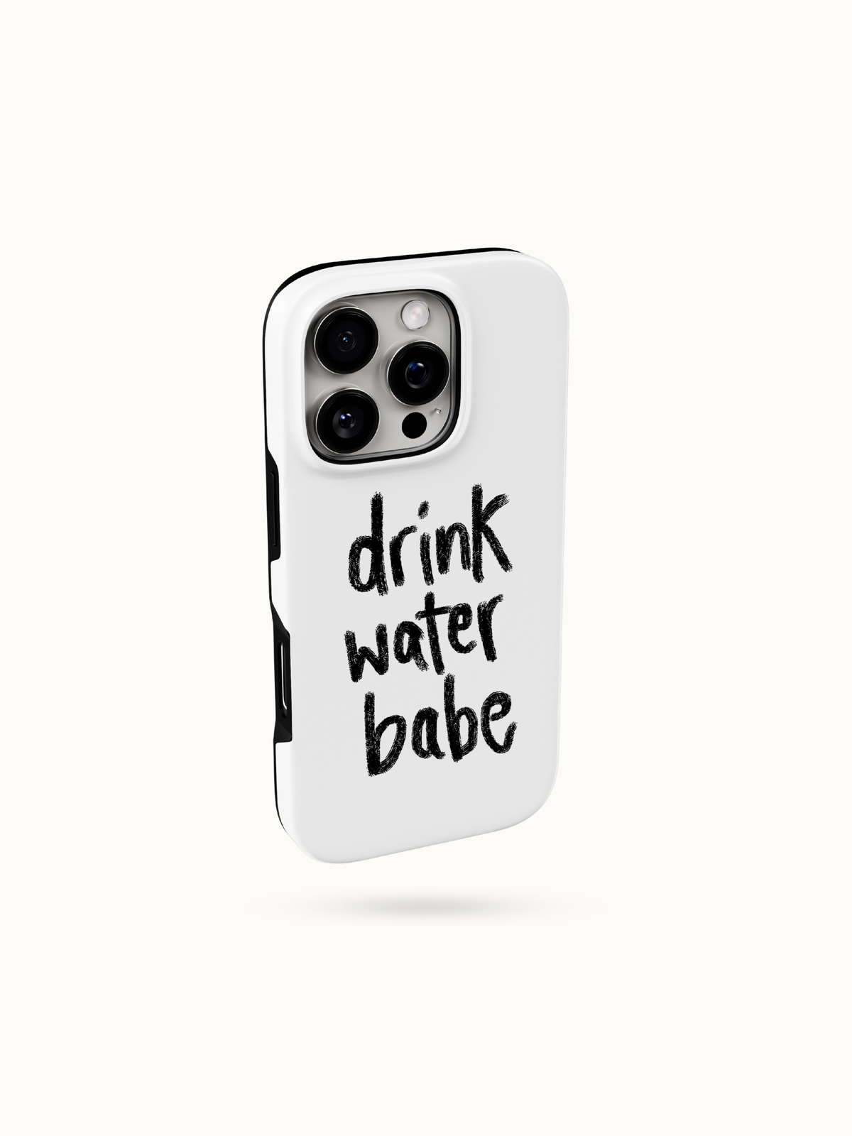 White iPhone case with black handwritten drink water babe lettering, three-quarter back view with camera cutout