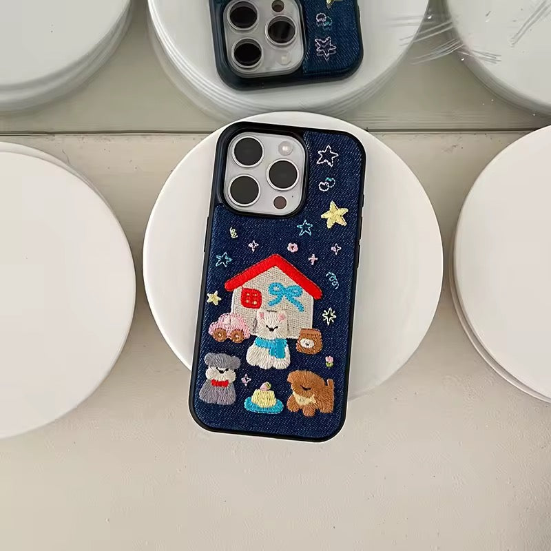 Phone case with teddy bear design on a white surface