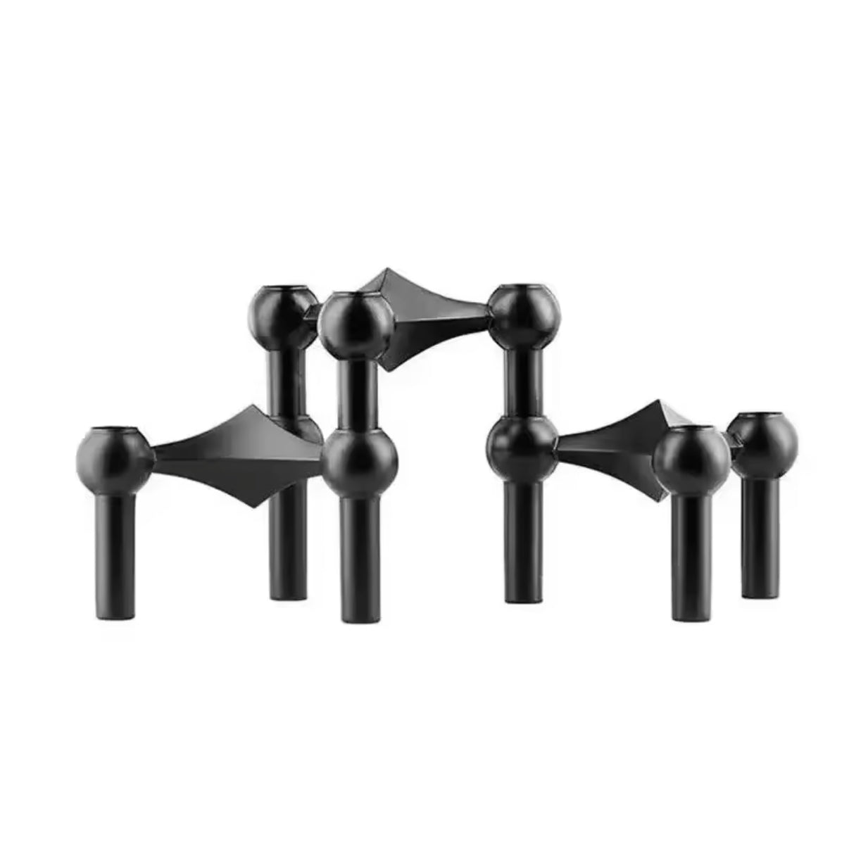 The candlestick displayed in a home décor store setting.