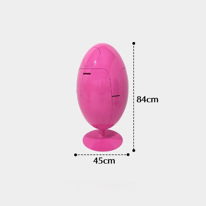 Pink oval-shaped object with dimensions labeled on a white background