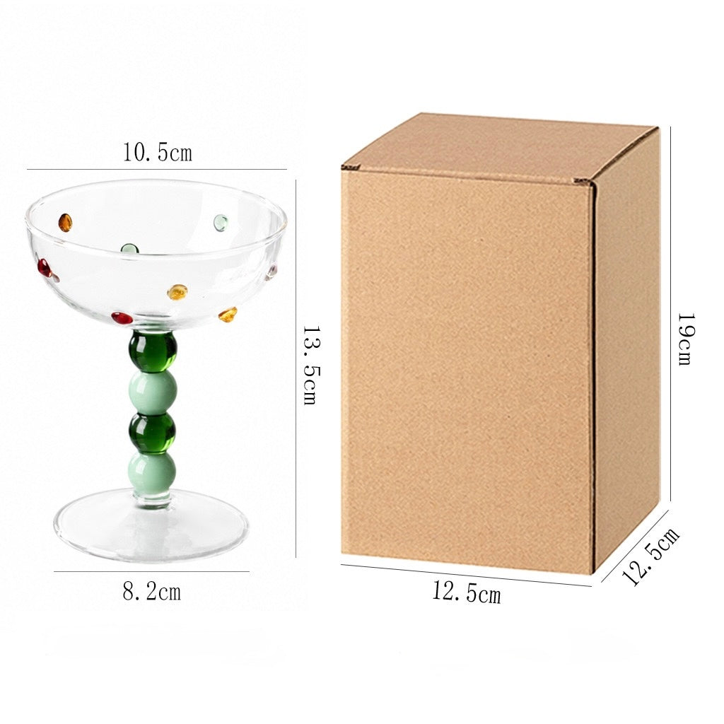 Green dessert cup with raised polka dots, ball stem and product dimensions