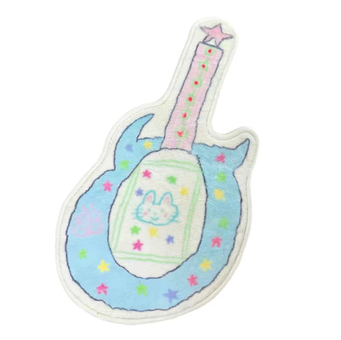 A guitar-shaped plush pillow with a white border, featuring pastel blue, pink, and white embroidered details, including a bunny face on the body and colorful star accents.