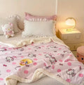 Cozy pastel bedroom featuring Hello Kitty sherpa blanket.