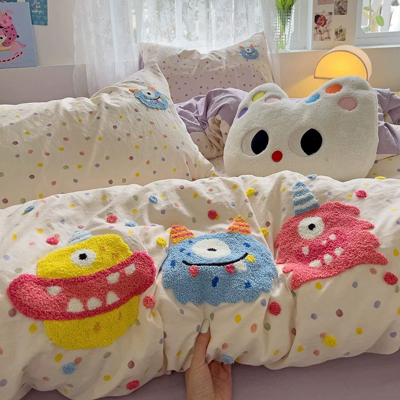 Cute kawaii bedding set with cartoon animal embroidery in pastel colors.