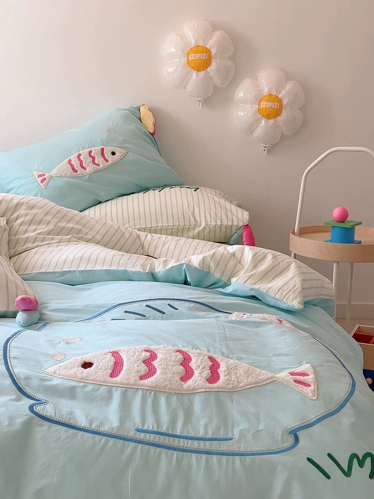 Aesthetic blue duvet cover set with fish motif, ideal for teen and college dorm bedrooms.