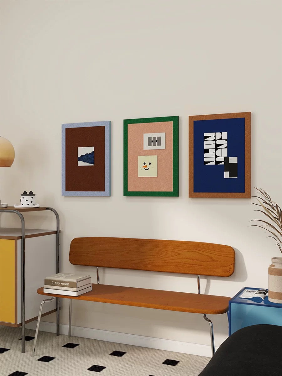 Three felt memo boards for wall display in a colorful sitting area.