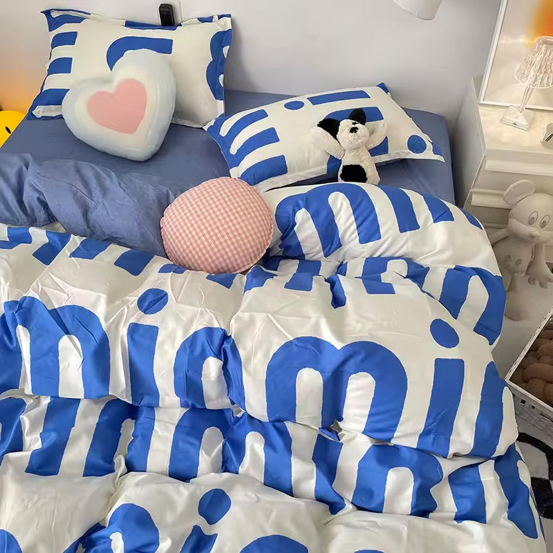 Bold blue letter bedding set in cozy Korean-style bedroom