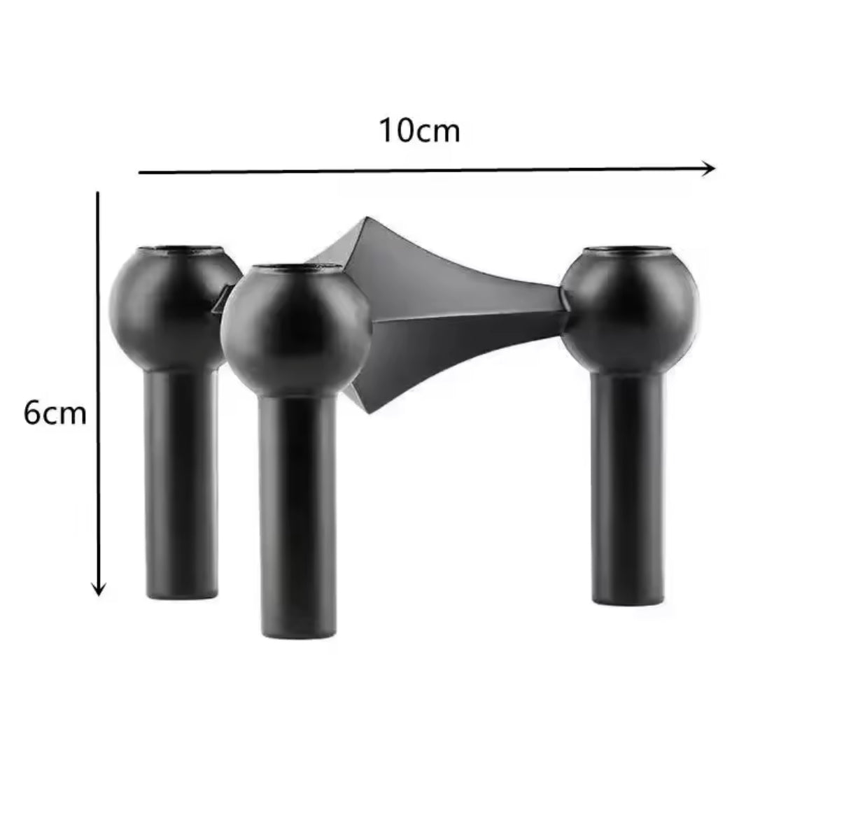 The candle holder on a patio table, suitable for outdoor gatherings.