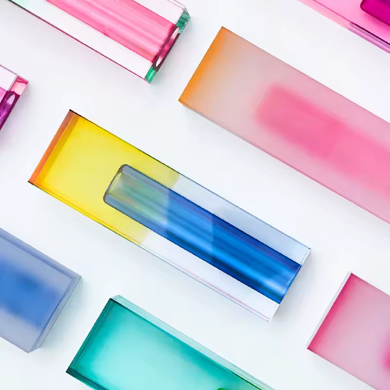 Colorful rectangular objects with gradient effects on a white background
