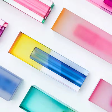Colorful rectangular objects with gradient effects on a white background