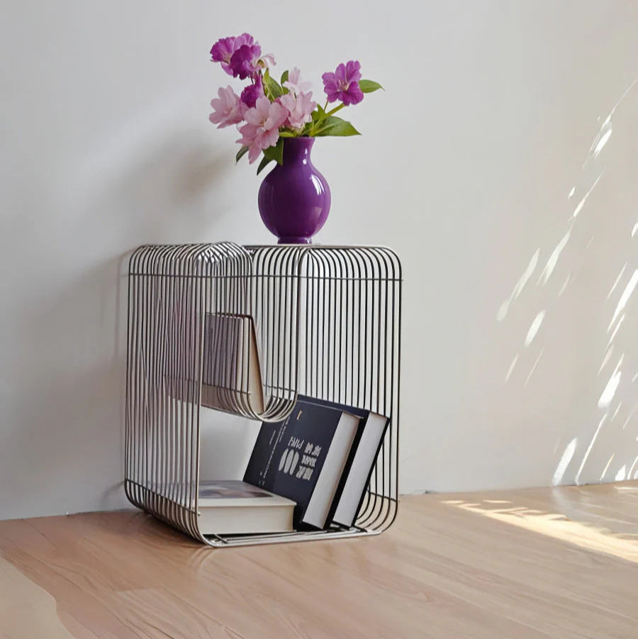 Minimalist metal end table styled with a marble lamp in Scandinavian living room