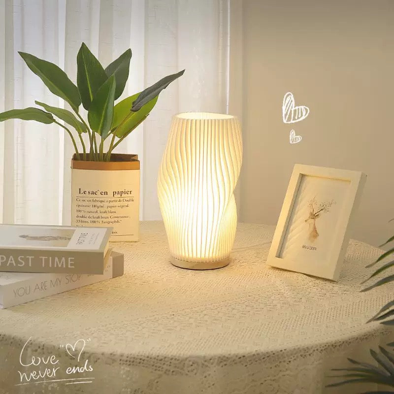 Modern striped desk lamp with touch dimming, USB charging, and wooden base. Eco-friendly 3D printed PLA lampshade for bedside decor.