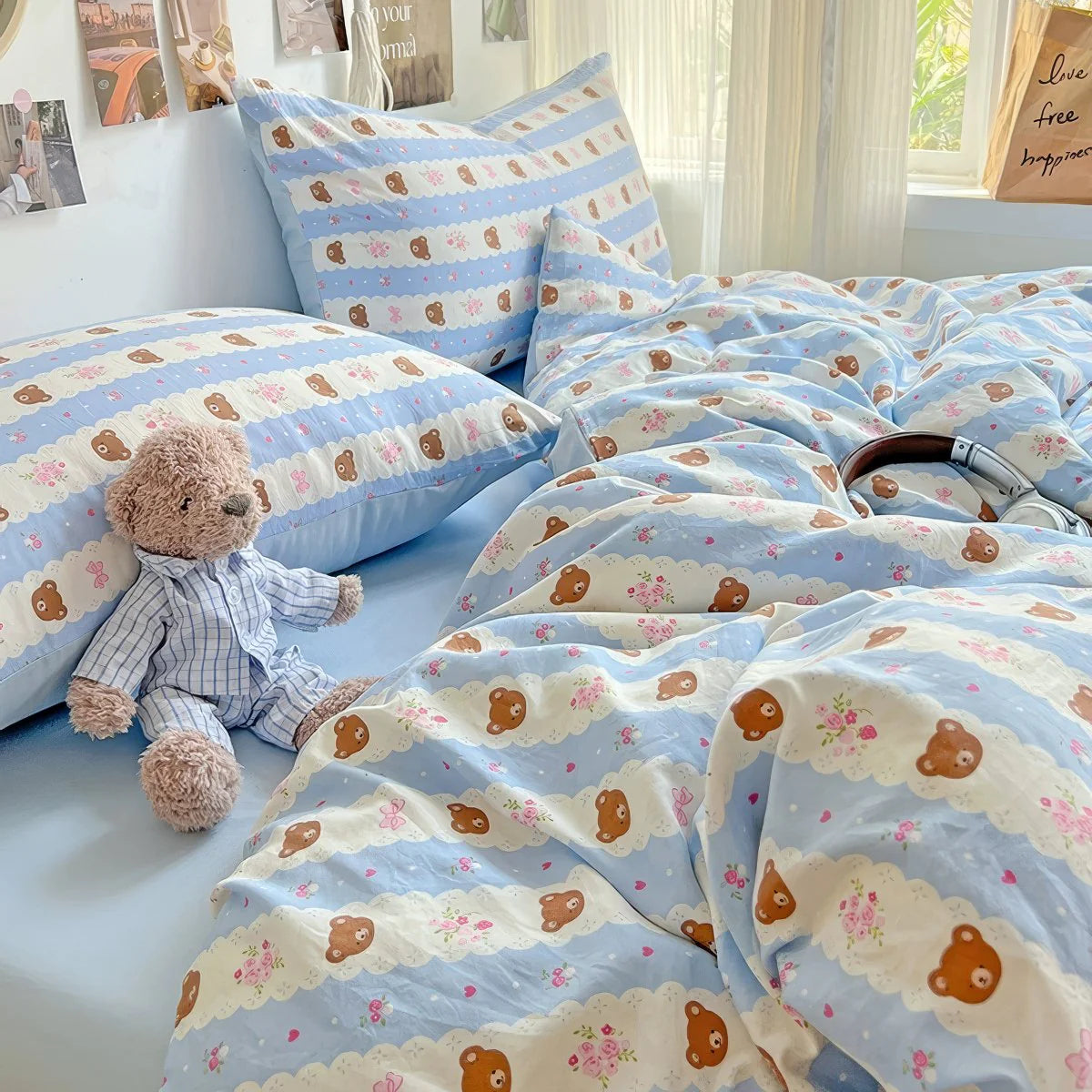 Cute sky-blue bedding for teen girls with teddy bear embroidery and cozy cotton texture.