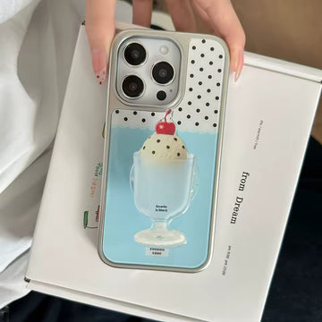 Phone case with ice cream design held over a box