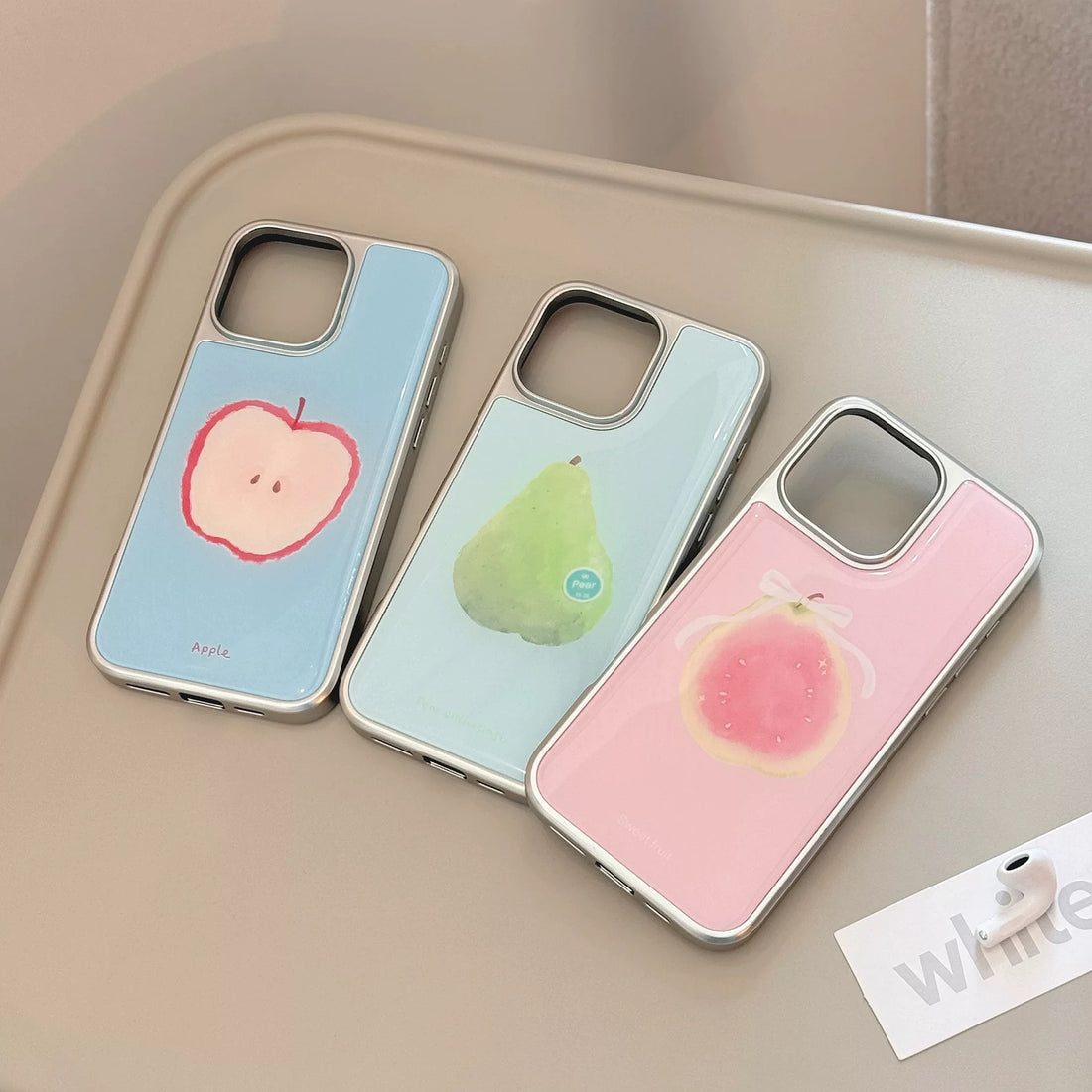 Kawaii pastel guava iPhone case with glossy pink background and silver border – perfect for soft girl aesthetic.